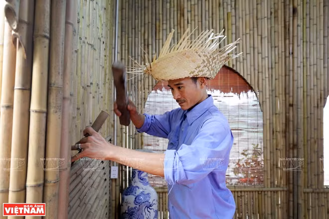 Une commune de Hanoï spécialisée dans la construction en bambou ảnh 3