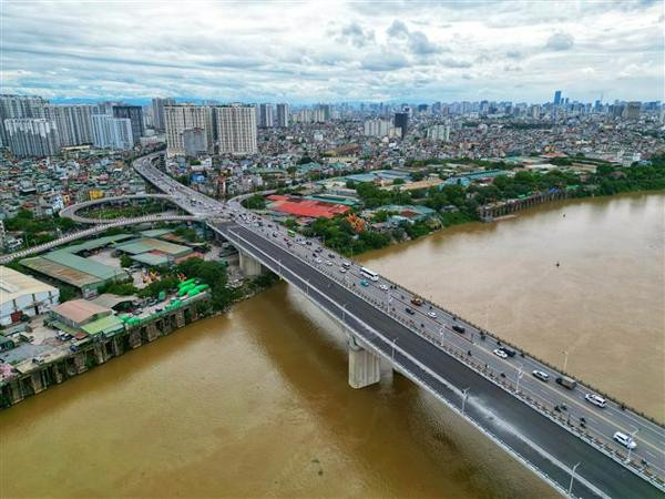 Le PM à la cérémonie inaugurale de la 2e phase du pont Vinh Tuy, à Hanoï ảnh 3 Le PM à la cérémonie inaugurale de la 2e phase du pont Vinh Tuy, à Hanoï ảnh 3