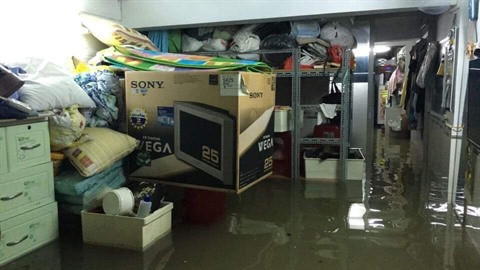 Passage du typhon USAGI: des rues de Hô Chi Minh-Ville inondées ảnh 3 Passage du typhon USAGI: des rues de Hô Chi Minh-Ville inondées ảnh 3