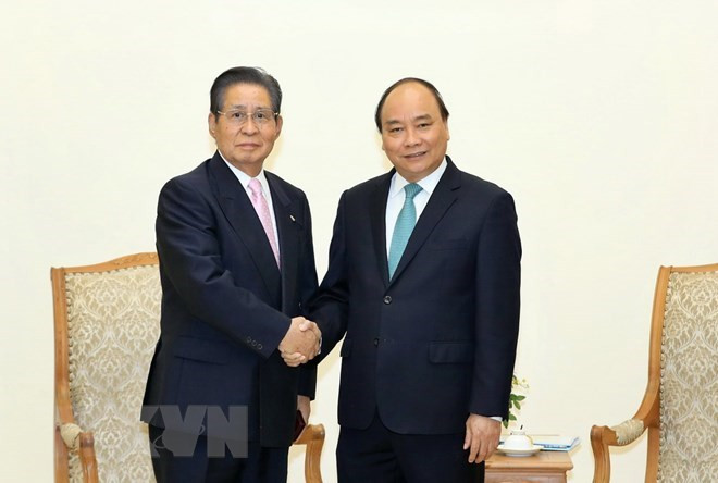 Nguyên Xuân Phuc reçoit le conseiller du Premier ministre japonais ảnh 1 Nguyên Xuân Phuc reçoit le conseiller du Premier ministre japonais ảnh 1