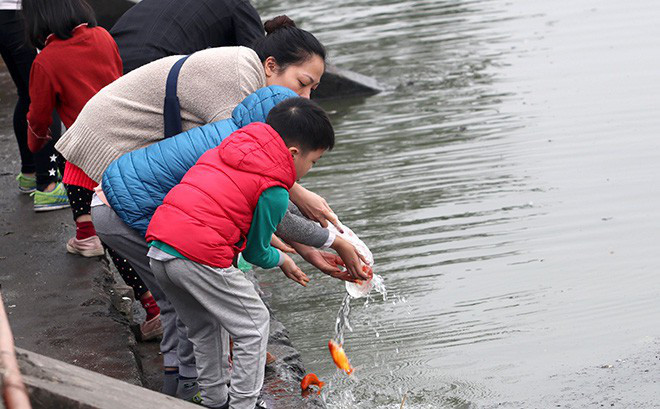 Les traditions du Têt honorent les Génies du foyer ảnh 1 Les traditions du Têt honorent les Génies du foyer ảnh 1