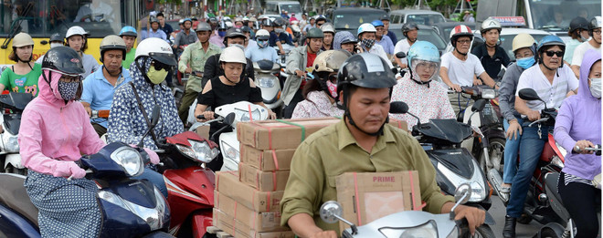 Le port du casque au Vietnam vu par les médias internationaux ảnh 1 Le port du casque au Vietnam vu par les médias internationaux ảnh 1