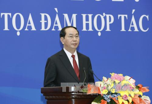 Tran Dai Quang au colloque de coopération économique et commerciale Vietnam-Chine ảnh 1 Tran Dai Quang au colloque de coopération économique et commerciale Vietnam-Chine ảnh 1