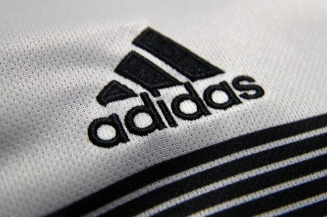 Adidas envisage de déplacer ses commandes de la Chine vers le Vietnam ảnh 1