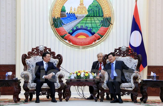 Le Premier ministre laotien appuie la coopération financière avec le Vietnam ảnh 1 Le Premier ministre laotien appuie la coopération financière avec le Vietnam ảnh 1