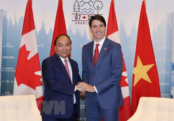 Entretien entre les Premiers ministres vietnamien et canadien ảnh 1