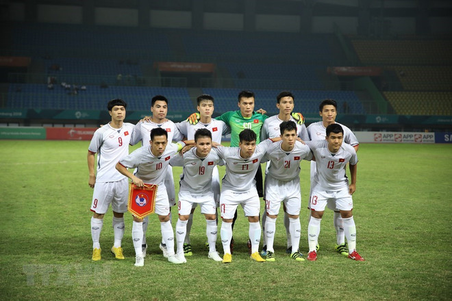 Le PM décerne le satisfecit à l'équipe olympique de football masculin du Vietnam ảnh 1 Le PM décerne le satisfecit à l'équipe olympique de football masculin du Vietnam ảnh 1