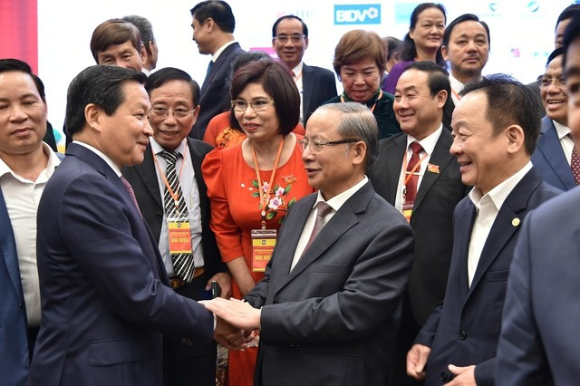 Le vice-Premier ministre Lê Minh Khai au quatrième Congrès national de l’Association des PME ảnh 1