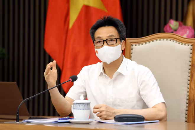 Le vice-PM Vu Duc Dam rencontre des entreprises soutenant le Fonds de vaccination contre le COVID-19 ảnh 1 Le vice-PM Vu Duc Dam rencontre des entreprises soutenant le Fonds de vaccination contre le COVID-19 ảnh 1