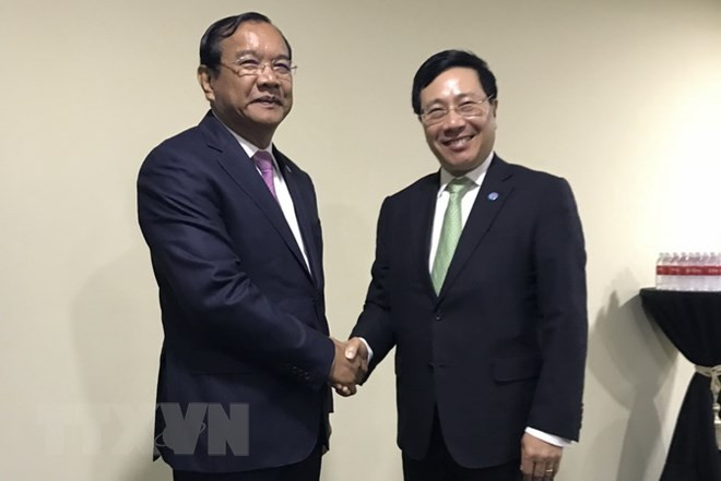 AMM-51 : le vice-PM Pham Binh Minh rencontre les ministres cambodgien et norvégien ảnh 1
