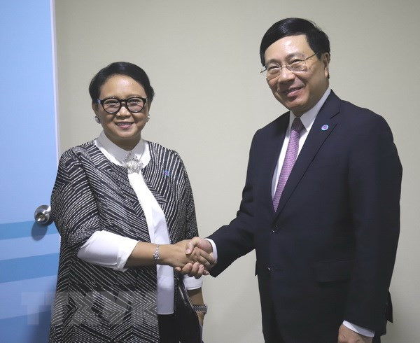 Le vice-PM Pham Binh Minh rencontre ses homologues en marge de l'AMM-51 ảnh 3 Le vice-PM Pham Binh Minh rencontre ses homologues en marge de l'AMM-51 ảnh 3