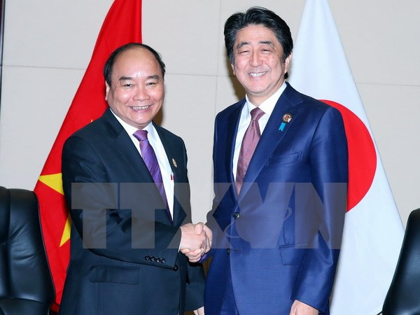 Le PM Nguyen Xuan Phuc rencontre ses homologues japonais et néo-zélandais ảnh 1 Le PM Nguyen Xuan Phuc rencontre ses homologues japonais et néo-zélandais ảnh 1
