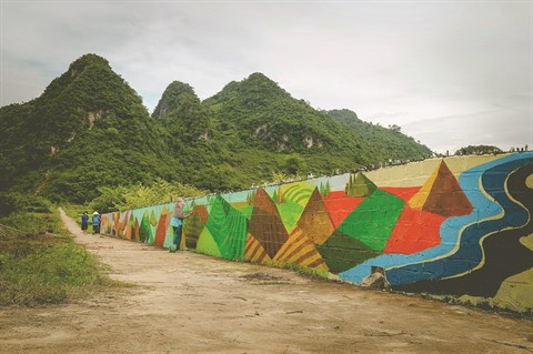 Un village aux fresques murales à Hoà Binh ảnh 2