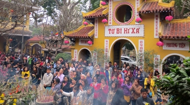 Aller à la pagode au Nouvel An lunaire - belle coutume des Vietnamiens ảnh 1 Aller à la pagode au Nouvel An lunaire - belle coutume des Vietnamiens ảnh 1