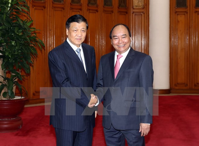 Des dirigeants vietnamiens reçoivent le haut responsable du Parti communiste chinois Liu Yunshan ảnh 1 Des dirigeants vietnamiens reçoivent le haut responsable du Parti communiste chinois Liu Yunshan ảnh 1