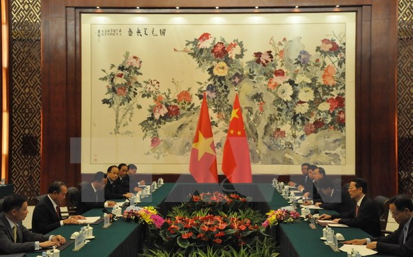 Vietnam-Chine: le vice-PM permanent Truong Hoà Binh rencontre le vice-PM Zhang Gaoli ảnh 2 Vietnam-Chine: le vice-PM permanent Truong Hoà Binh rencontre le vice-PM Zhang Gaoli ảnh 2