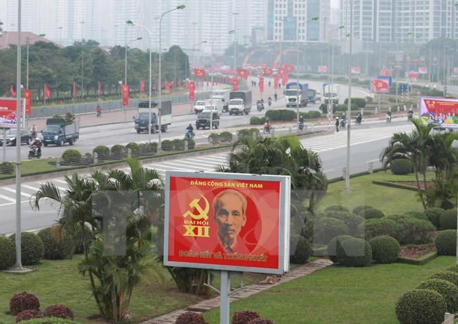 Xinhua et Kyodo couvrent le XIIe Congrès national du PCV ảnh 1 Xinhua et Kyodo couvrent le XIIe Congrès national du PCV ảnh 1
