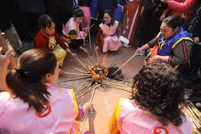 Concours de cuisson du riz dans la commune de Thi Câm ảnh 1