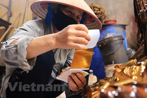 La fabrication des feuilles d’or dans le village de Kiêu Ky, à Hanoï ảnh 1 La fabrication des feuilles d’or dans le village de Kiêu Ky, à Hanoï ảnh 1