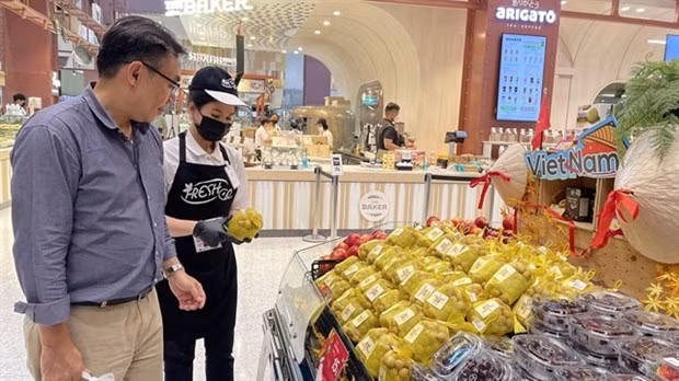 Les longanes vietnamiens trouvent des clients sur le marché thaïlandais ảnh 1