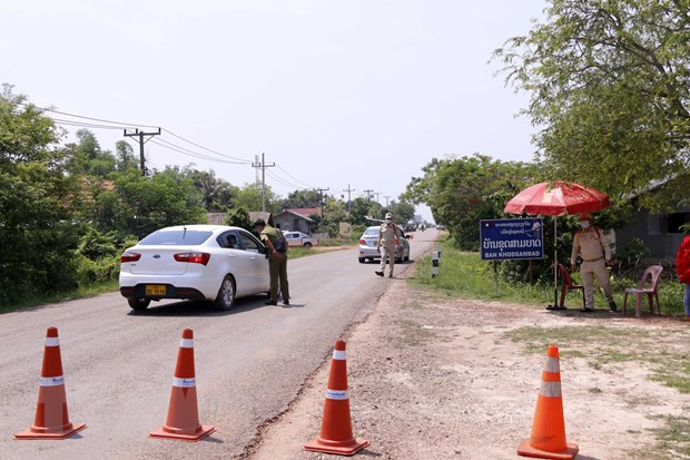 L'ambassade du Vietnam au Laos recommande le respect des réglementations de prévention du COVID-19 ảnh 1