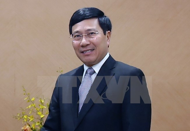Le vice-PM Pham Binh Minh rend visite à l’ambassade du Vietnam en Chine ảnh 1 Le vice-PM Pham Binh Minh rend visite à l’ambassade du Vietnam en Chine ảnh 1