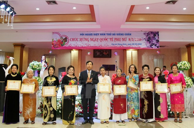 Les femmes vietnamiennes au Laos fêtent leur Journée ảnh 1 Les femmes vietnamiennes au Laos fêtent leur Journée ảnh 1