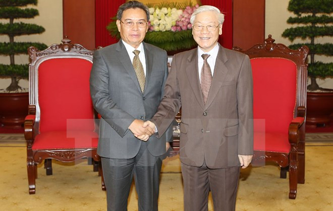 Le leader du PCV reçoit des hôtes laotiens ảnh 1 Le leader du PCV reçoit des hôtes laotiens ảnh 1