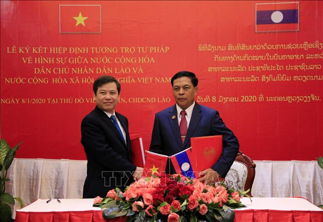 Les Parquets suprêmes du Vietnam et du Laos renforcent leur coopération ảnh 1