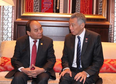 Activités du PM Nguyen Xuan Phuc en marge de l’ASEM 11 ảnh 3 Activités du PM Nguyen Xuan Phuc en marge de l’ASEM 11 ảnh 3
