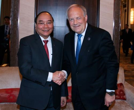 Activités du PM Nguyen Xuan Phuc en marge de l’ASEM 11 ảnh 2 Activités du PM Nguyen Xuan Phuc en marge de l’ASEM 11 ảnh 2