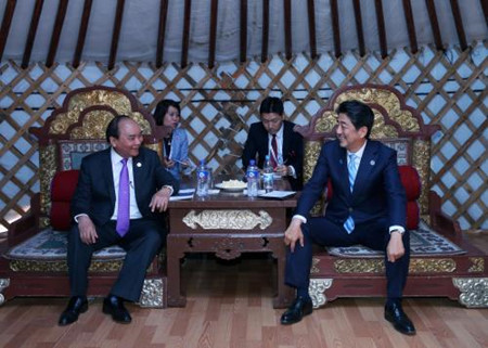 Activités du PM Nguyen Xuan Phuc en marge de l’ASEM 11 ảnh 6 Activités du PM Nguyen Xuan Phuc en marge de l’ASEM 11 ảnh 6