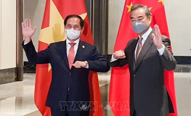 Le ministre des Affaires étrangères Bui Thanh Son en visite en Chine ảnh 1 Le ministre des Affaires étrangères Bui Thanh Son en visite en Chine ảnh 1