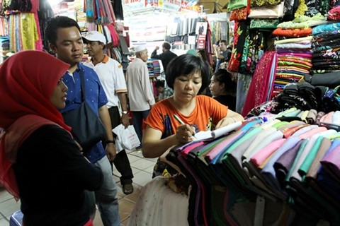 Les marchés traditionnels de Hô Chi Minh-Ville évoluent ảnh 1