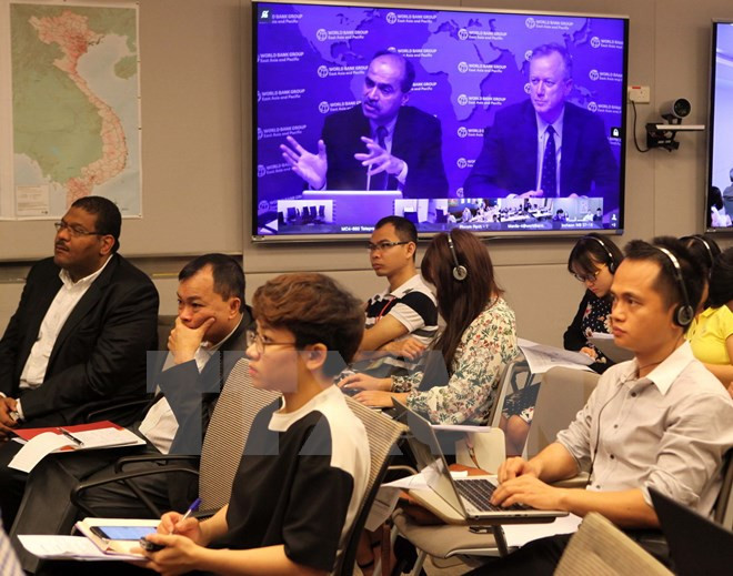 L'économie du Vietnam dépasse les évolutions mondiales de façon satisfaisante ảnh 1