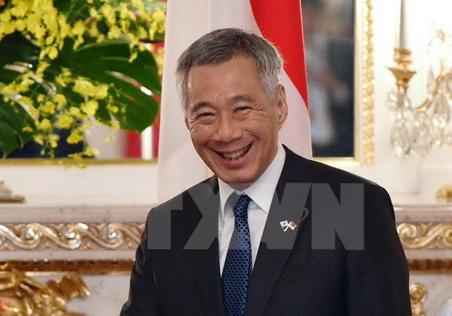 Le Premier ministre singapourien entame sa visite officielle au Vietnam ảnh 1 Le Premier ministre singapourien entame sa visite officielle au Vietnam ảnh 1