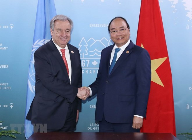 Sommet du G7 élargi: le PM vietnamien rencontre des dirigeants du monde ảnh 1 Sommet du G7 élargi: le PM vietnamien rencontre des dirigeants du monde ảnh 1