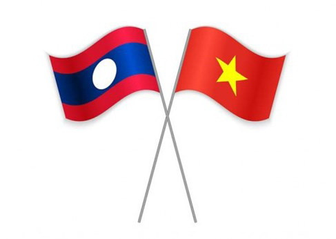 L'ambassade du Laos présente ses vœux de Nouvel An à son homologue vietnamien à Singapour ảnh 1 L'ambassade du Laos présente ses vœux de Nouvel An à son homologue vietnamien à Singapour ảnh 1