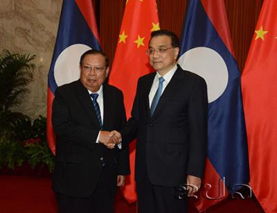 Le PM chinois rencontre le président laotien ảnh 1 Le PM chinois rencontre le président laotien ảnh 1