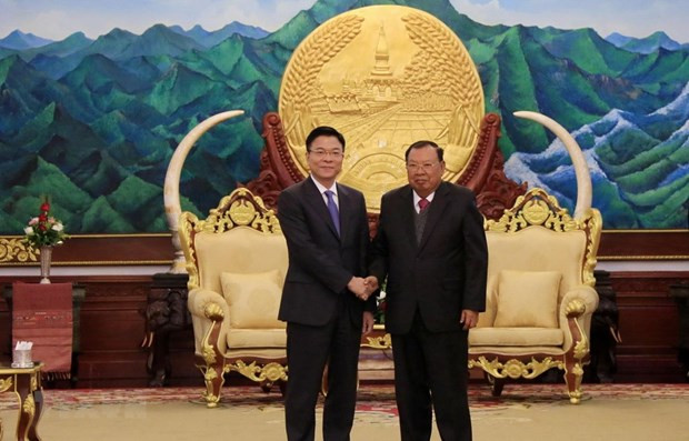 Une délégation du ministère vietnamien de la Justice en visite de travail au Laos ảnh 1 Une délégation du ministère vietnamien de la Justice en visite de travail au Laos ảnh 1