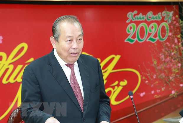 Le vice-PM Truong Hoa Binh rencontre la communauté vietnamienne en Suisse à l'occasion du Têt ảnh 1 Le vice-PM Truong Hoa Binh rencontre la communauté vietnamienne en Suisse à l'occasion du Têt ảnh 1