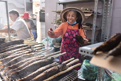 Des milliers de Vietnamiens fêtent le Dieu de la Richesse ảnh 2 Des milliers de Vietnamiens fêtent le Dieu de la Richesse ảnh 2