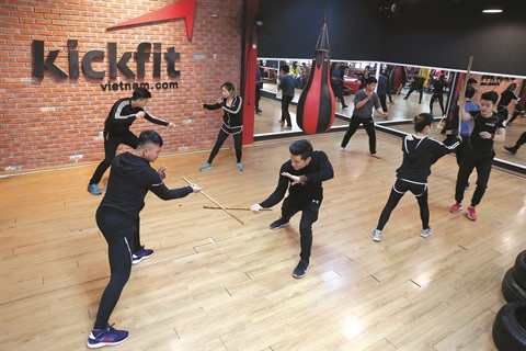 L’arnis, art martial philippin, fait de plus en plus d’adeptes au Vietnam ảnh 1