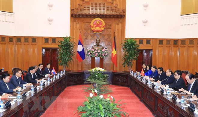Le PM laotien souligne les contributions de l'ancien secrétaire Do Muoi aux relations bilatérales ảnh 1