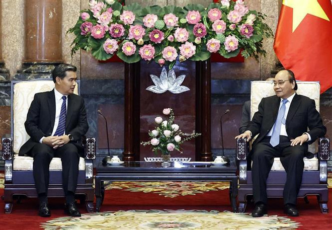 Le président Nguyên Xuân Phuc reçoit le président du Parquet populaire suprême du Laos ảnh 1 Le président Nguyên Xuân Phuc reçoit le président du Parquet populaire suprême du Laos ảnh 1