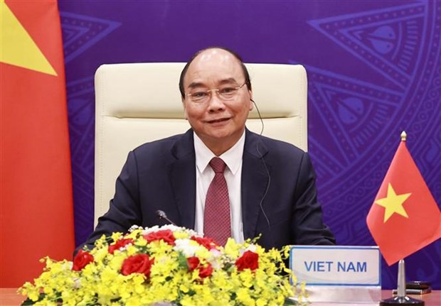 Le président vietnamien assiste à la cérémonie d'ouverture du Sommet international sur le climat ảnh 1 Le président vietnamien assiste à la cérémonie d'ouverture du Sommet international sur le climat ảnh 1
