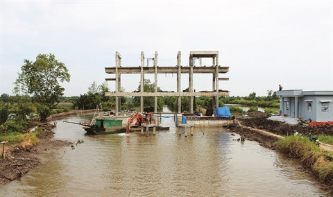 Un ouvrage hydraulique dans la province de Cà Mau. Photo : Thê Anh/VNA/CVN Un ouvrage hydraulique dans la province de Cà Mau. Photo : Thê Anh/VNA/CVN