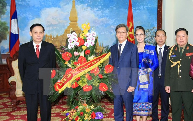 Félicitations au peuple laotien à l’occasion de la Fête nationale du Laos ảnh 1 Félicitations au peuple laotien à l’occasion de la Fête nationale du Laos ảnh 1