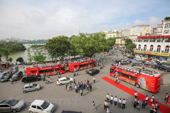 La capitale Hanoi en bus à impériale à toit ouvert ảnh 1 La capitale Hanoi en bus à impériale à toit ouvert ảnh 1