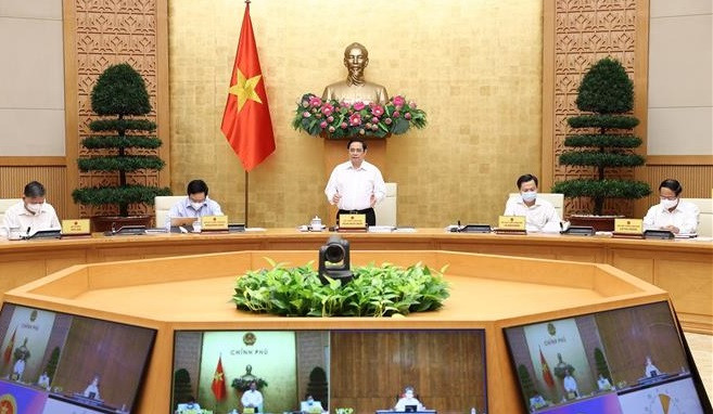 Le Premier ministre Pham Minh Chinh préside la réunion périodique du gouvernement en août ảnh 1 Le Premier ministre Pham Minh Chinh préside la réunion périodique du gouvernement en août ảnh 1